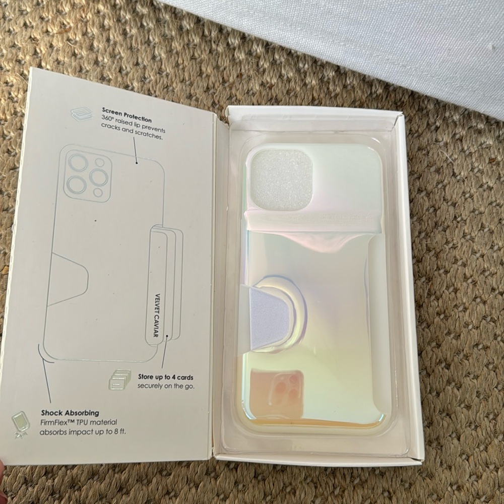 Velvet caviar new in box, wallet phone case. Iridescent. Pretty protective.